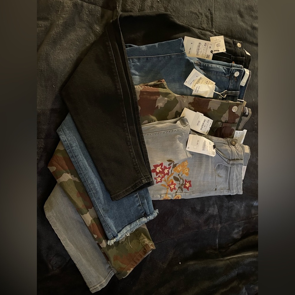 These pair of jeans are shades of brown, army green and olive green.